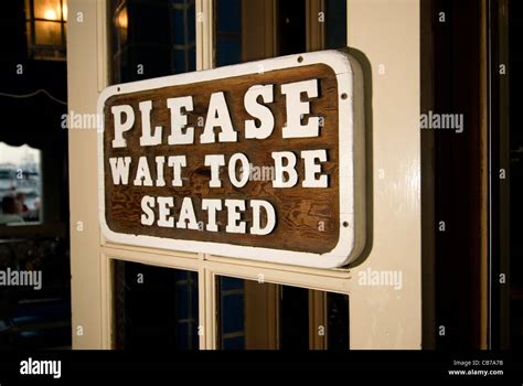 Please Wait Sign On Restaurant Hi Res Stock Photography And Images Alamy