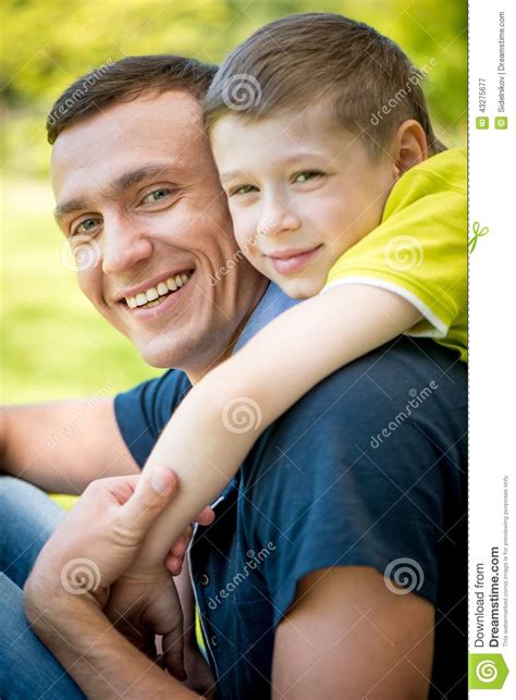 Happy Father And Son Hugging In The Park Stock Image Image Of Father