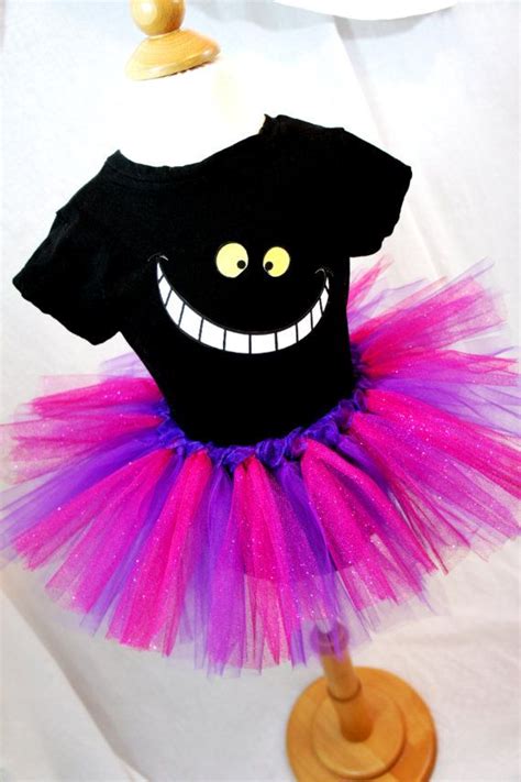 Create your own cheshire cat costume for halloween ♥ known from alice in wonderland » find images, accessories & a tutorial for your diy costume! Cheshire Cat Tutu and Tee Set Adults & Children Listing | Cheshire cat costume, Disney halloween ...