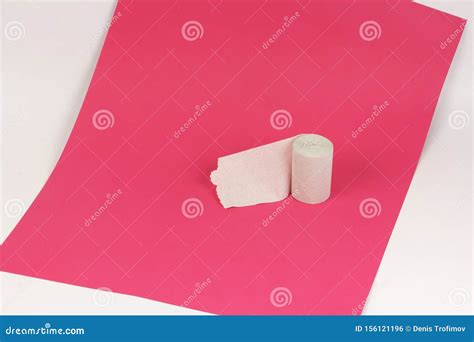 Rough Recycled White Toilet Paper On Pink Paper On White Background