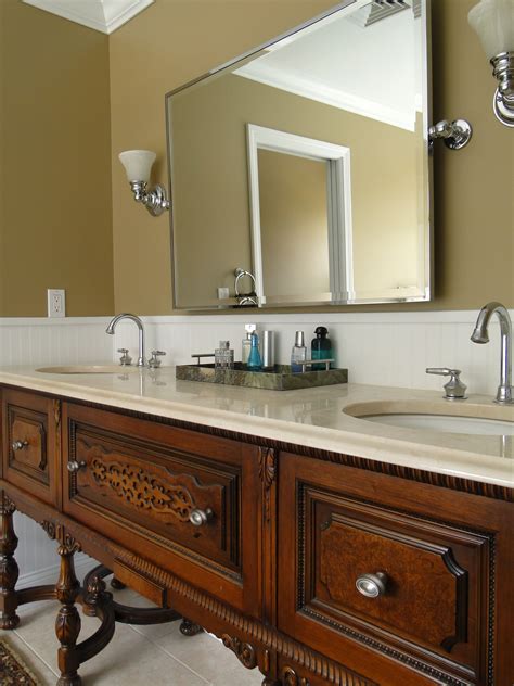 Our very first step was to cut this thing to height. repurposed antique buffet/sideboard turned bath double ...