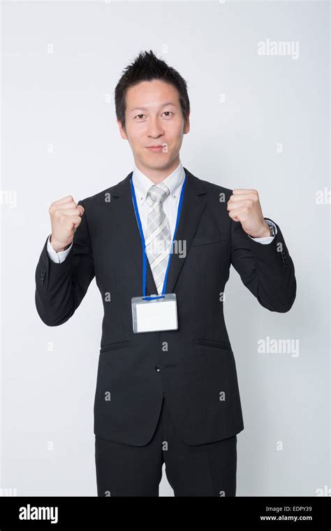 Businessman Clenching His Fists Stock Photo Alamy