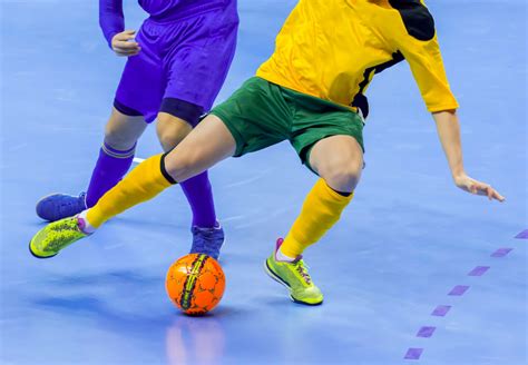 Futsal balls are the pivotal point of any practice or game, but trying to find a quality product can be hard. Football Futsal Ball and man Team. Indoor Soccer Sports ...