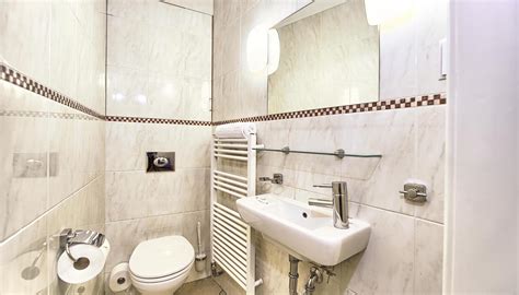 The master bedroom w/ attached bath is shared by 2. Three Bedroom Apartment | Residence Brehova