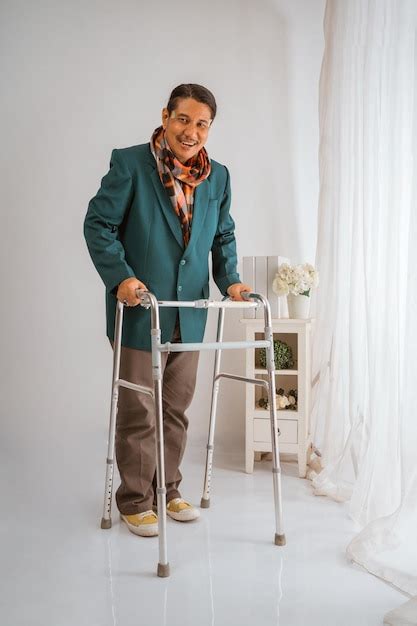 Premium Photo Senior Elderly Man Standing With Holding Zimmer Walking