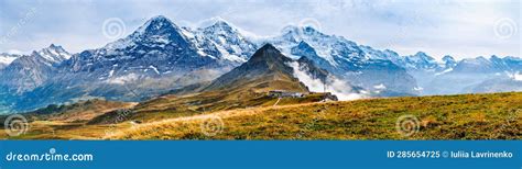 Autumn Panorama Of Grindelwald Valley And Swiss Alps Mountain Range Of