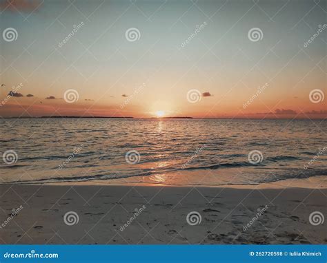 Maldives, Tropical Paradise. a Beautiful Sunset in the Ocean with Small