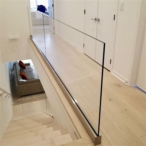 Update Your Hallway Glass Panel Railing Opens Up A Narrow Hallway And Helps Create A Fresh
