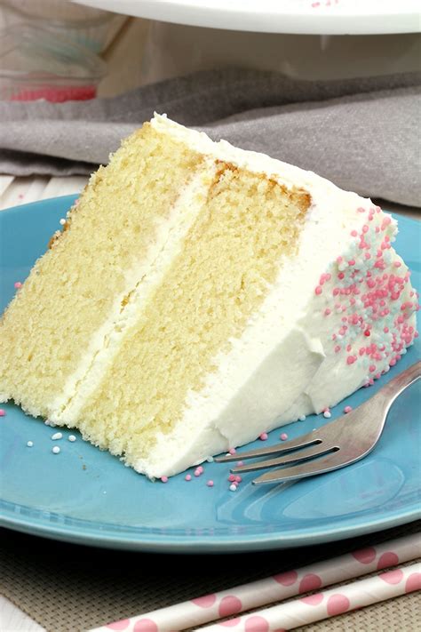 Recipe for making a whipped cream frosting that is soft, light, and not too sweet that goes on top of cakes. Vanilla Cake with Whipped Cream Cheese Frosting - Sweet ...