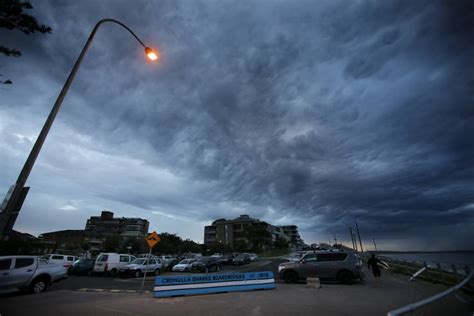 Storm Clouds No Deterrent To Morning Beachgoers St