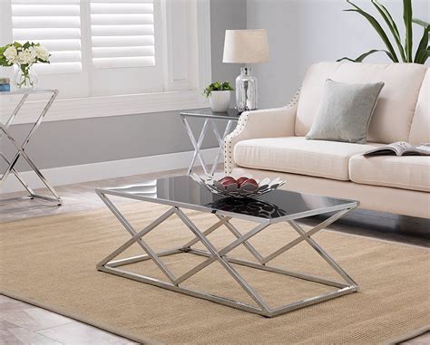 From seating furniture and coffee tables to curtains and rugs, you need to plan and choose everything carefully and according to the theme of your interiors. Amazon : Chrome Finish / Black Glass Top Metal Frame Cocktail Coffee Table with Double X Designs ...