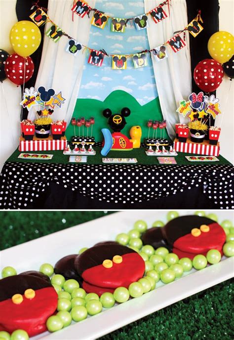 Mickey mouse birthday table set up, goodie bags, cake and souvenirs. Mickey Mouse Clubhouse Birthday Party // Hostess with the ...