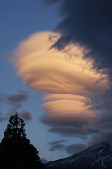 Lenticular clouds coming off Mt. Shasta, California at sunset. 10/2014 ...