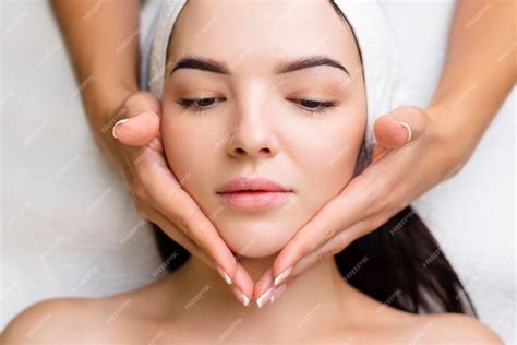 Premium Photo Professional Antiaging Facial Massage Action Relaxing