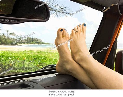 Feet On Dashboard Stock Photos And Images Agefotostock