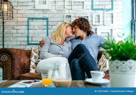 Couple Kissing On A Sofa Stock Image Image Of Closed 125318481