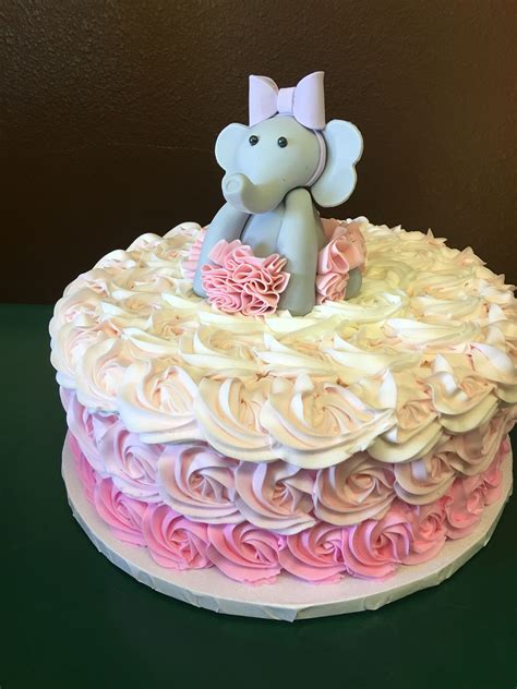 Two cake rounds are frosted in buttercream, and the side ridges are created by running a scoring tool around. Pink tutu elephant birthday cake! | Elephant birthday ...