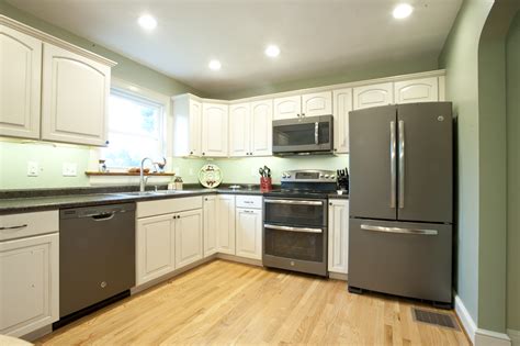 White kitchen cabinets with black slate appliances. Consumers Go Gray in a Stylish Way…with GE Slate Kitchens ...