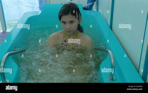 Attractive Young Girl Bathing In A Bath In A Health Spa The Young Girls Enjoy The Outdoor