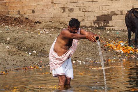 varanasi india dec 26 2019 hindu taking ritual bath in the river ganga editorial stock