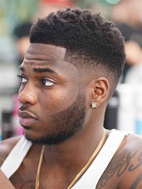 Any man looking for cute hairstyles for naturally curly hair must try this haircut. 13 Iconic Haircuts for Black Men