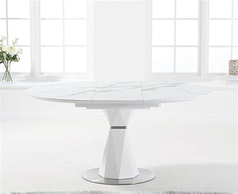 [from diningroomfurniture round tables are perfect for corners and other tight spaces. Jackson 120cm Round White Extending Dining Table with ...
