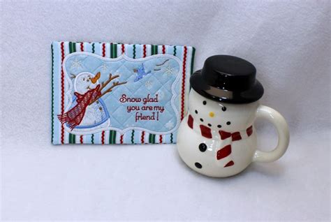 Snow Glad Mug Rug · Omas Place Machine Embroidery Designs
