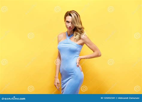 beautiful blonde model in blue dress posing at camera stock image image of blue isolated