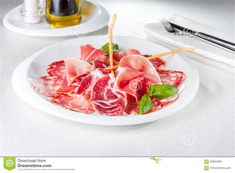 Assortment Of Delicatessen Cold Italian Meat Salami Ham And Bacon On