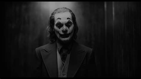 This wallpaper symbolizes the iconic line of the joker in the shape of the master criminal himself. Joaquin Phoenix As Joker Monochrome Wallpaper, HD Movies ...