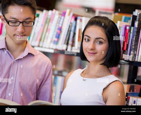 Group Of Young Students Working Together At The Library Stock Photo Alamy