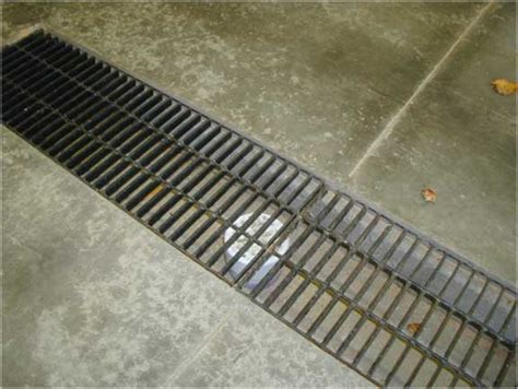I tried pouring a bunch of water down it to see if i could find the exit, but could not. Garage Drains | Smalltowndjs.com