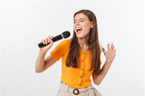 Premium Photo Young Pretty Woman Happy And Motivated Singing A Song