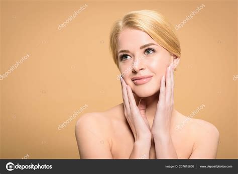 Beautiful Smiling Naked Girl Touching Face Looking Away Isolated Beige Stock Photo