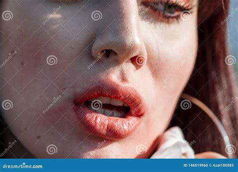 Woman Removes Lipstick From Lips Outdoors Stock Photo Image Of Close