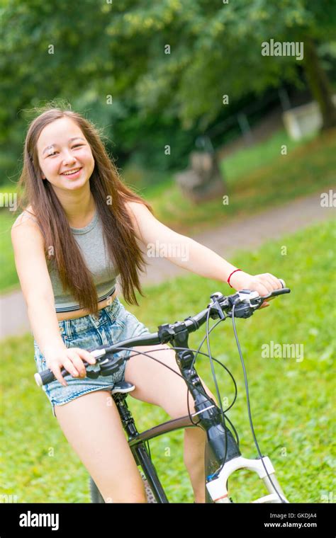 Teen Girl Ride Bike Stock Photo Alamy