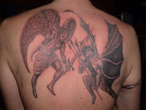Pin On Fighting Angel Tattoos