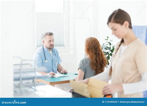 General Practitioner During Medical Consultation Stock Photo Image Of