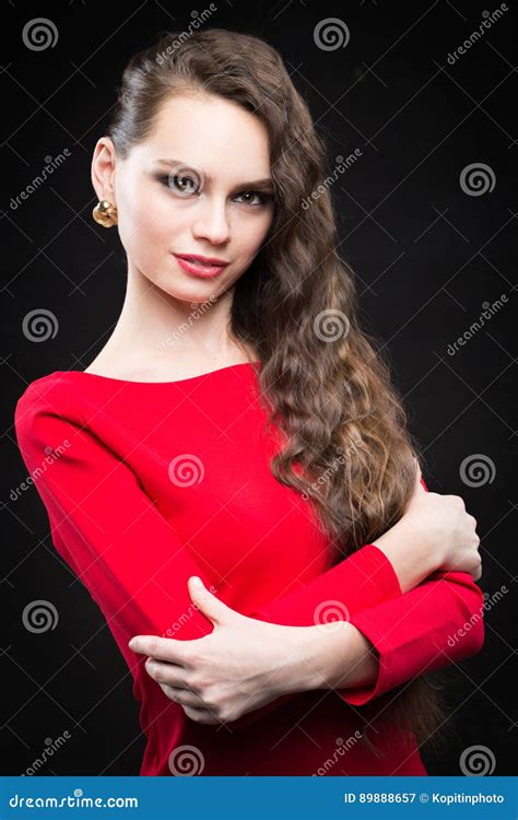 Beautiful Woman With Dark Hair And Evening Makeup Red Dress Stock