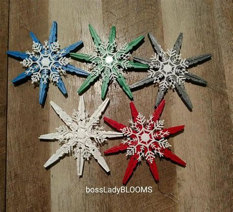Five Inch By Five Inch Wooden Glittered Clothespin Snowflake Ornaments