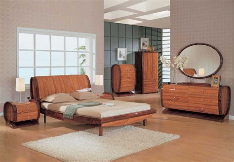 Primary bedroom boasting a luxurious bed and an elegant fireplace with a tv set just above it. Unique Bedroom Sets | Unique bedroom furniture ...