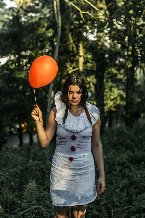 Creepy Clown Lady With Balloon In Woods · Free Stock Photo