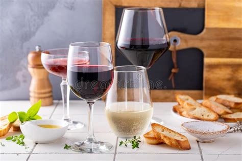 Variety Of Wine Glasses With Red White And Rose Wine Stock Photo