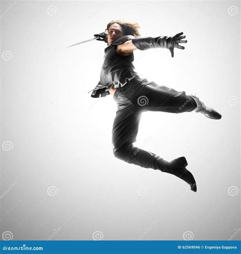 Man Jumping With A Sword Attack Stock Photo Image Of Domination