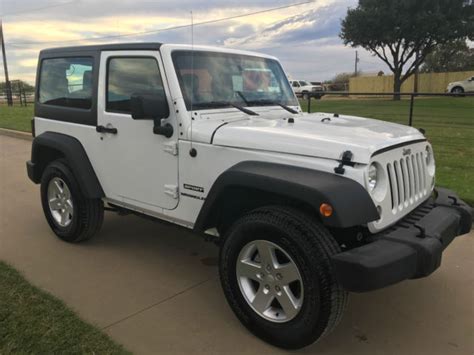 WHITE JEEP WRANGLER 2 DOOR 4WD - 1C4AJWAG9GL123403
