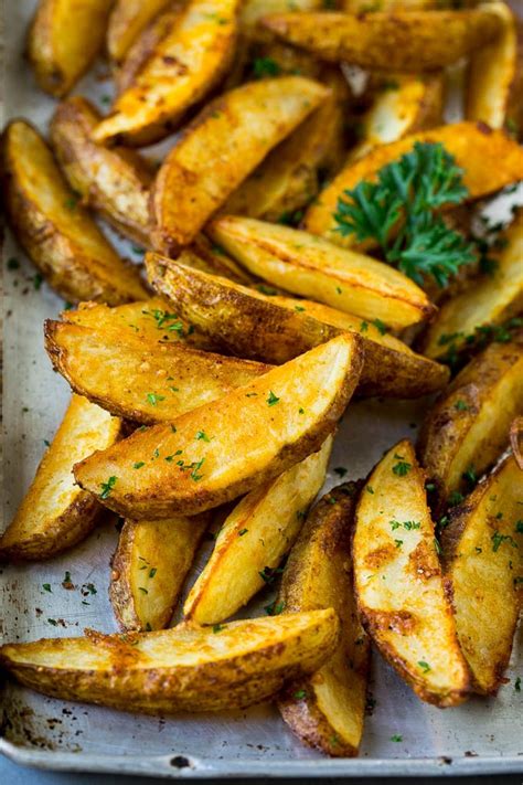 Slice hot potato open, apply 2 scoops of butter, 1 cup of cheese. Baked Potato Wedges - Dinner at the Zoo