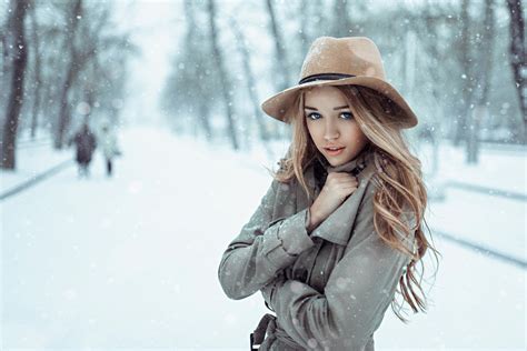 blonde trench coat snow cold women winter women outdoors dasha romanchenko hat blue