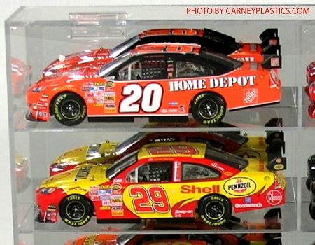 Hinged doors to help keep dust out and protect from unwanted handling. NASCAR Diecast Model Car Display Case 14 Car 1/24