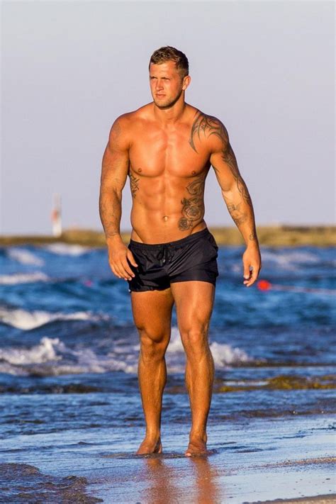 Dan Osborne Shows Off Buff Body During Topless Run On The Beach Before Cooling Off In The Shower