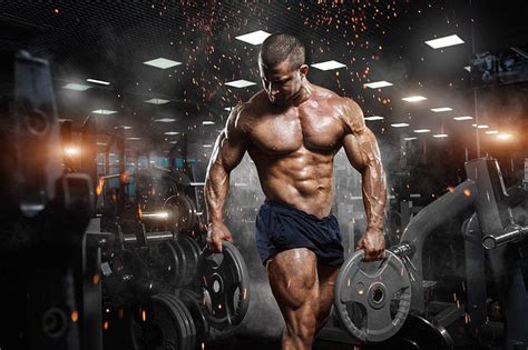 Download Bodybuilder Carrying Weight Hd Wallpaper
